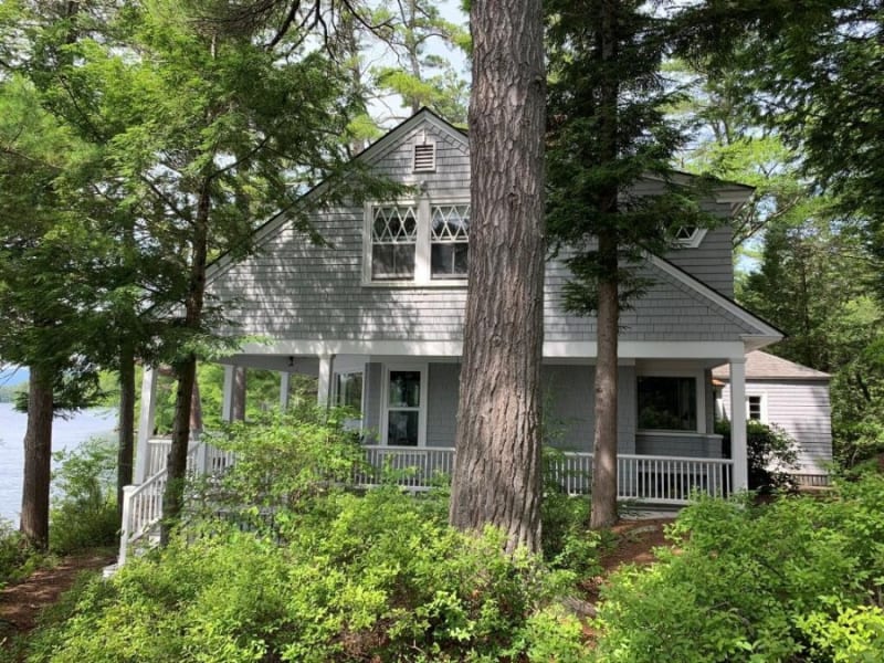 Three houses spread across the waterfront property