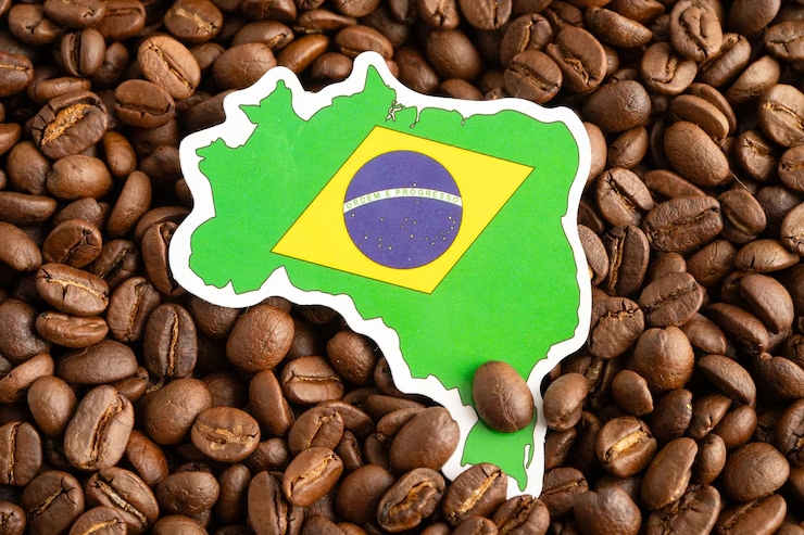 Mapa do Brasil e grãos de café