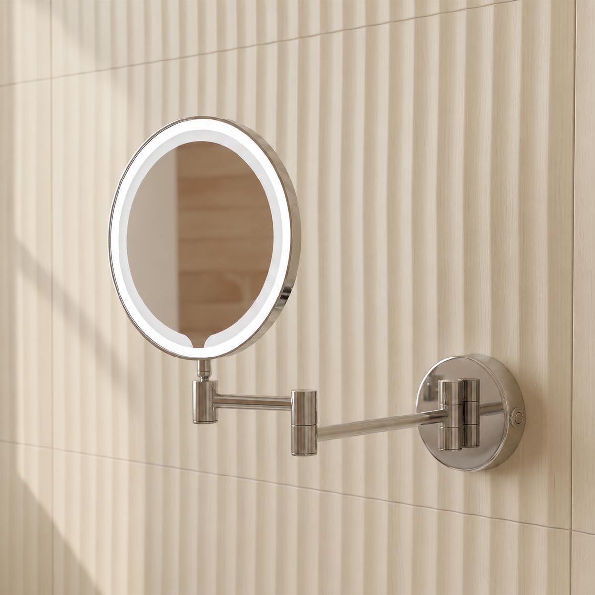 Illuminated magnifying mirror with sensor