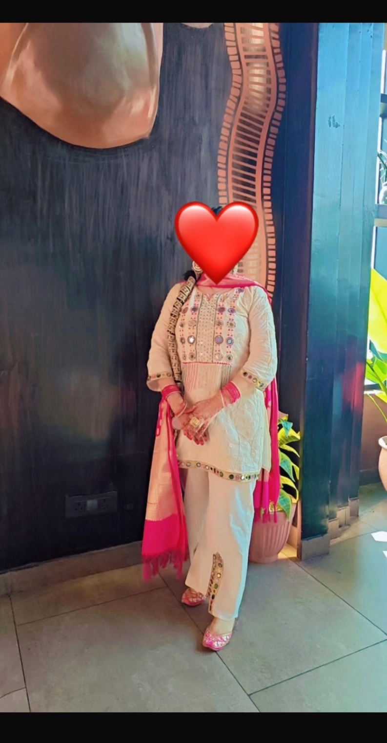 Beige suit with pink dupatta
