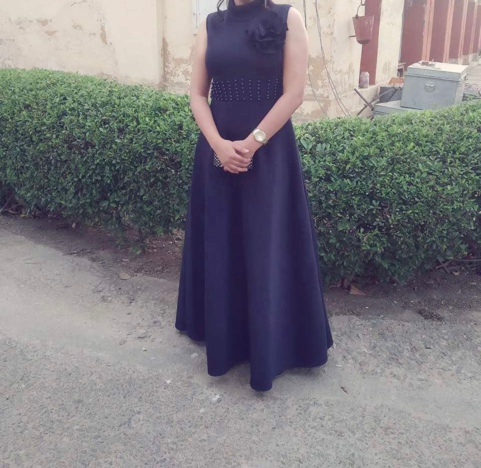 Elegant Navy Blue Sleeveless Maxi Dress with Embellished Waist