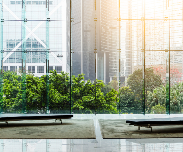 Office with glass windows and trees on the other side