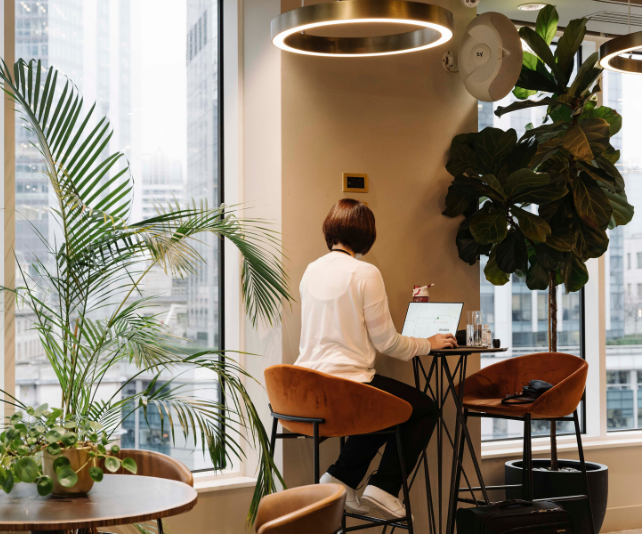 Woman working on a laptop in an Uncommon office