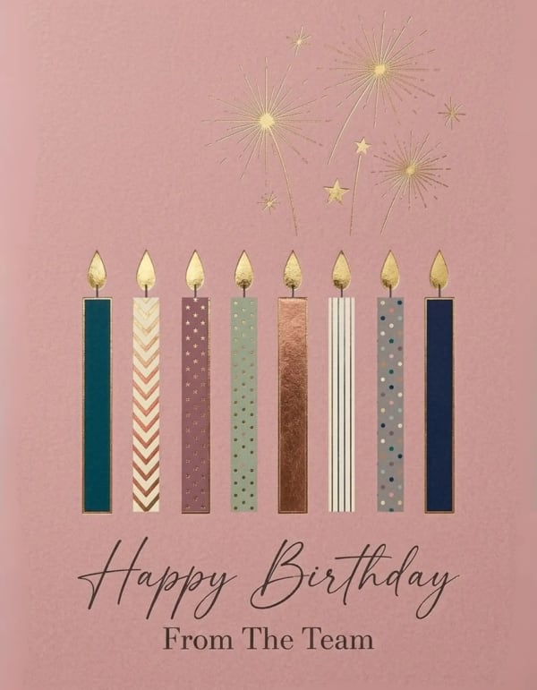 Elegant birthday card with candles and golden fireworks design.