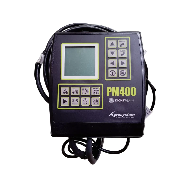 Monitor de Plantio Dickey John PM400 Novo instalado em uma cabine de trator durante o plantio de soja.
