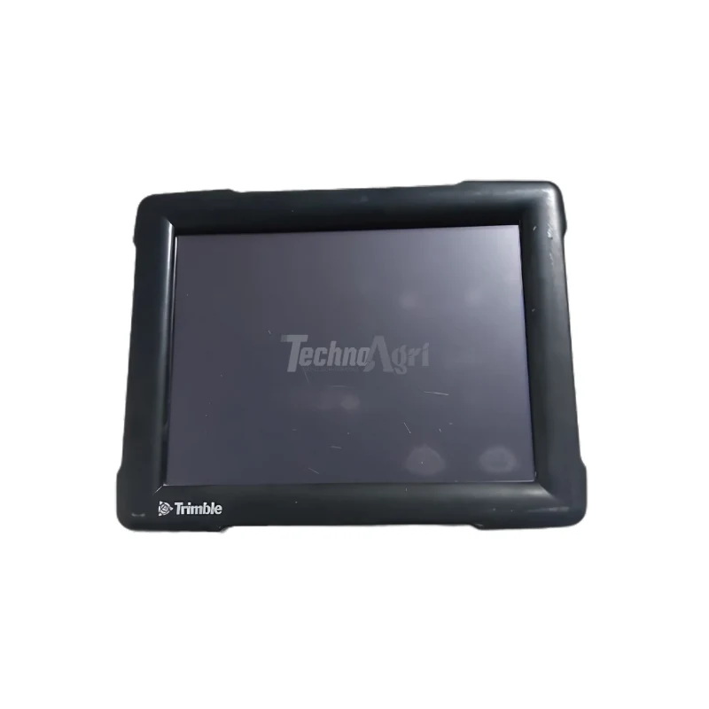 Monitor de plantio Trimble FM 1000 com RTK e Taxa Variável instalado em um trator moderno, em operação em uma lavoura.