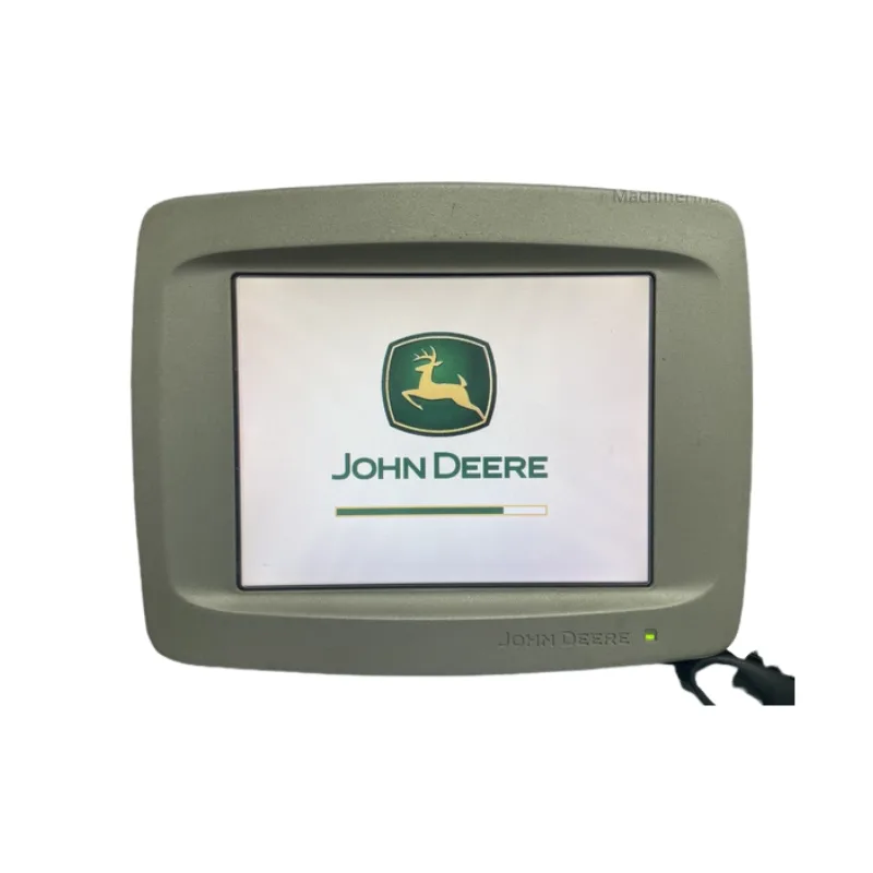 Monitor 2600 John Deere instalado em um trator, exibindo dados de plantio.