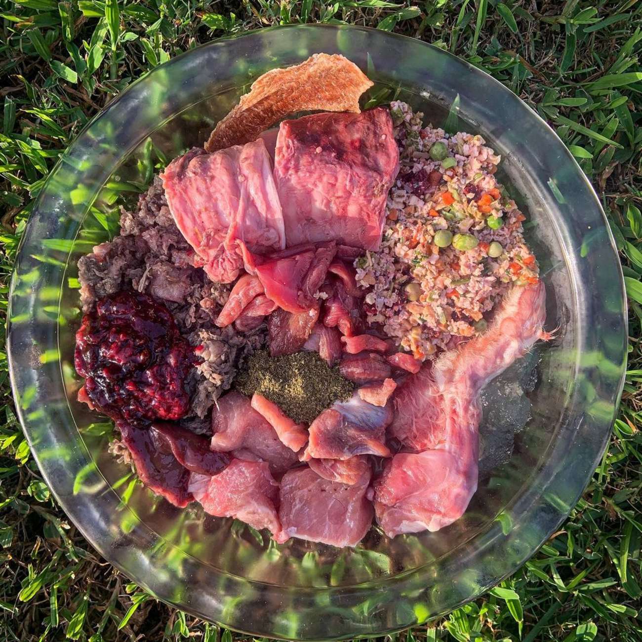 A couple of glass bowls of food