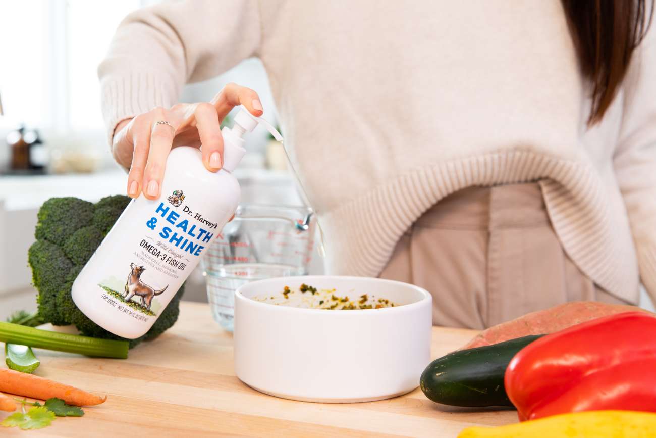 A woman pouring a bowl of food