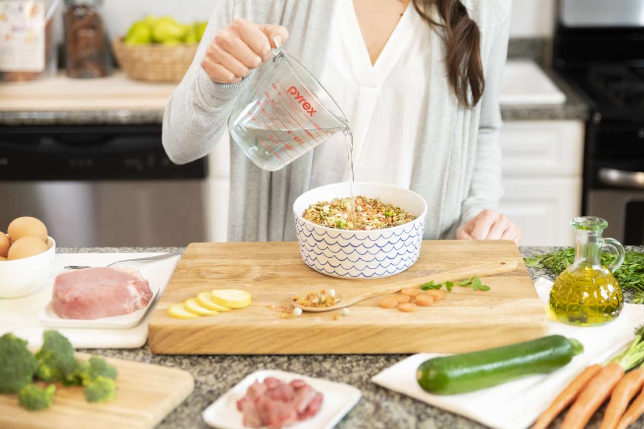 A person preparing food in a kitchen