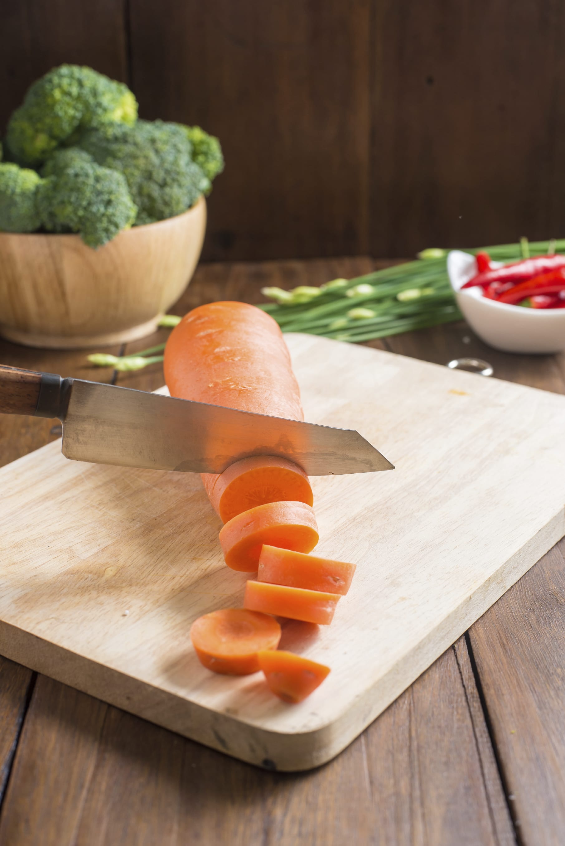 A carrot on a cutting board