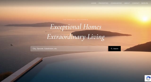 Premium theme homepage: a warm sunset photo of a coastline behind the serif headline Exceptional Homes, Extraordinary Living with a property search bar below it