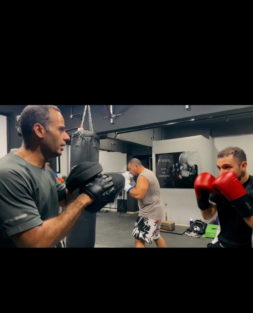 Boxing Classes Cairo - Pad Work Training Strike Gym