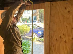 Technician measuring for installation