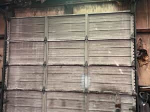 Worn garage door replacement