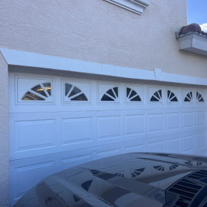 White garage door with windows