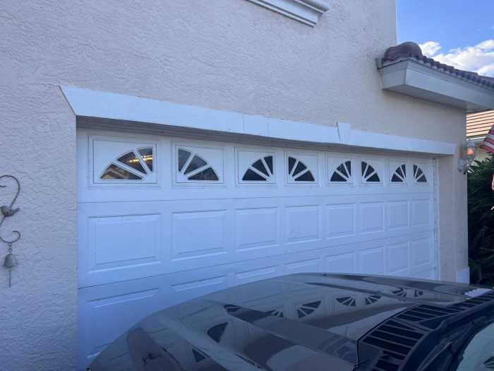 White garage door with windows