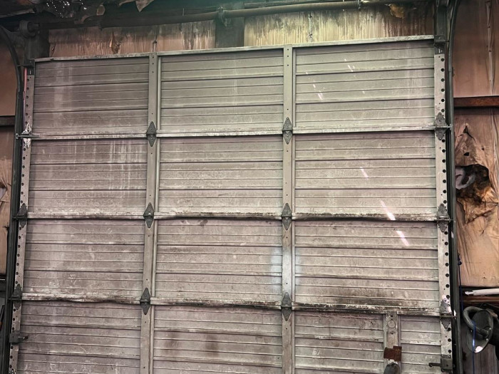 Worn garage door replacement