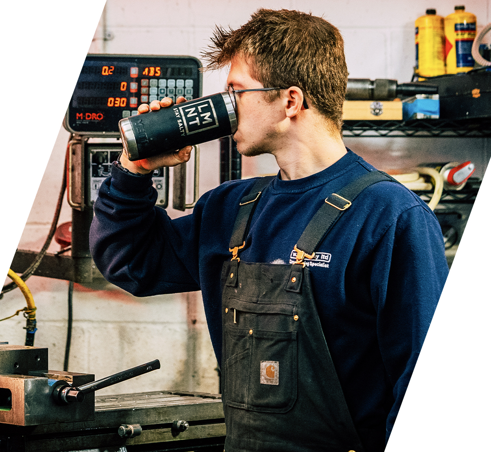 Alec Steele drinking from a LMNT Yeti