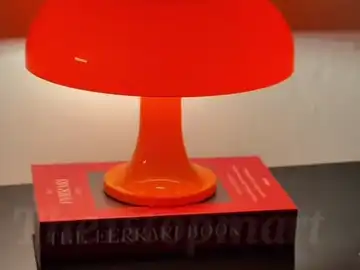 Mushroom LED lamp warm ambient glow on shelf