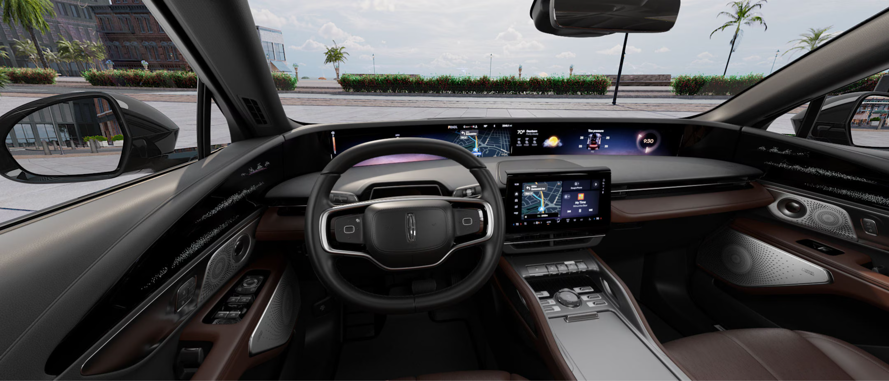 A modern luxury car interior with digital displays and brown leather seating against a sunny outdoor background with palm trees and a paved area.