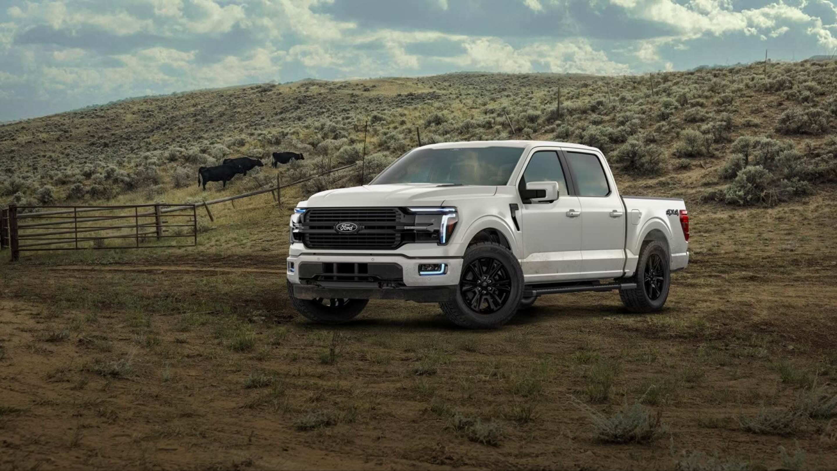 A white pickup truck sits on a dirt path with a rolling grassy hill and black cattle in the background.