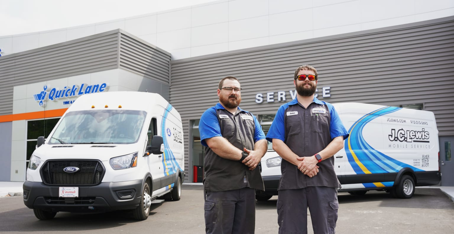 J.C. Lewis Mobile Service technicians and branded Ford service van