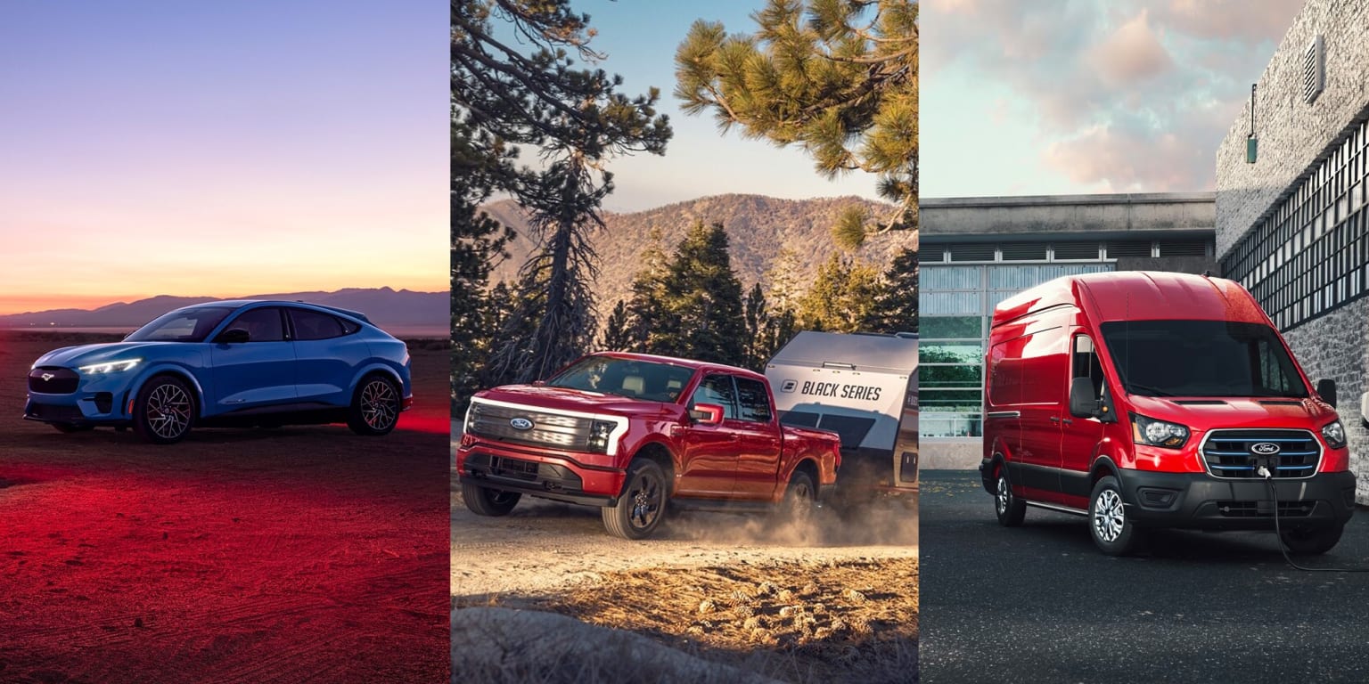 Image of vehicles in a parking lot: red truck, white truck, and red car.