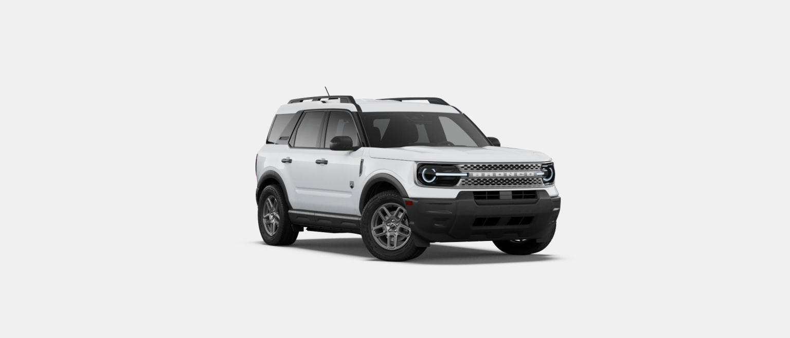 A white SUV is parked on a plain white background.