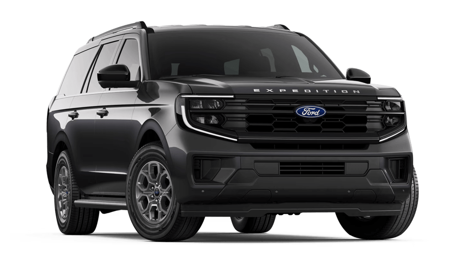 A dark grey SUV is parked against a plain white background.