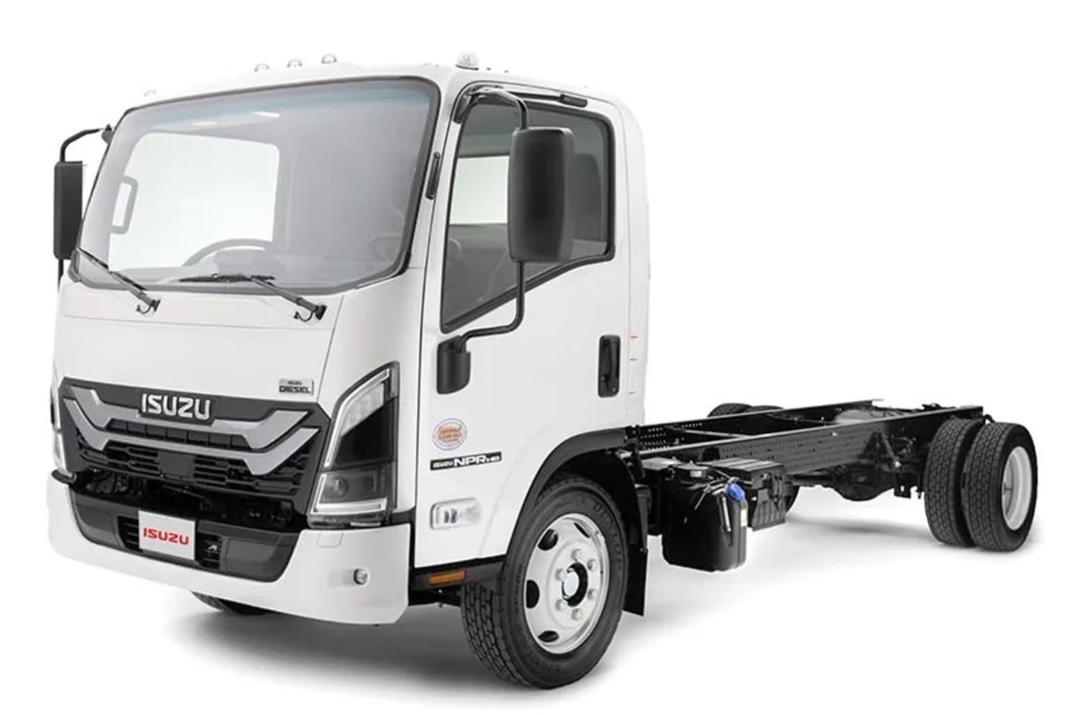 A white truck chassis with dual rear wheels displayed against a plain white background.