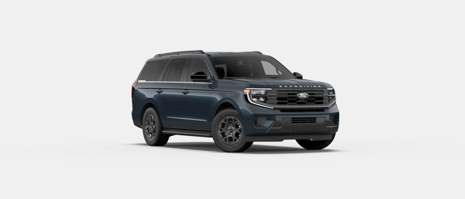 Off-road vehicle with a distinctive front grille and raised suspension, set against a plain background.