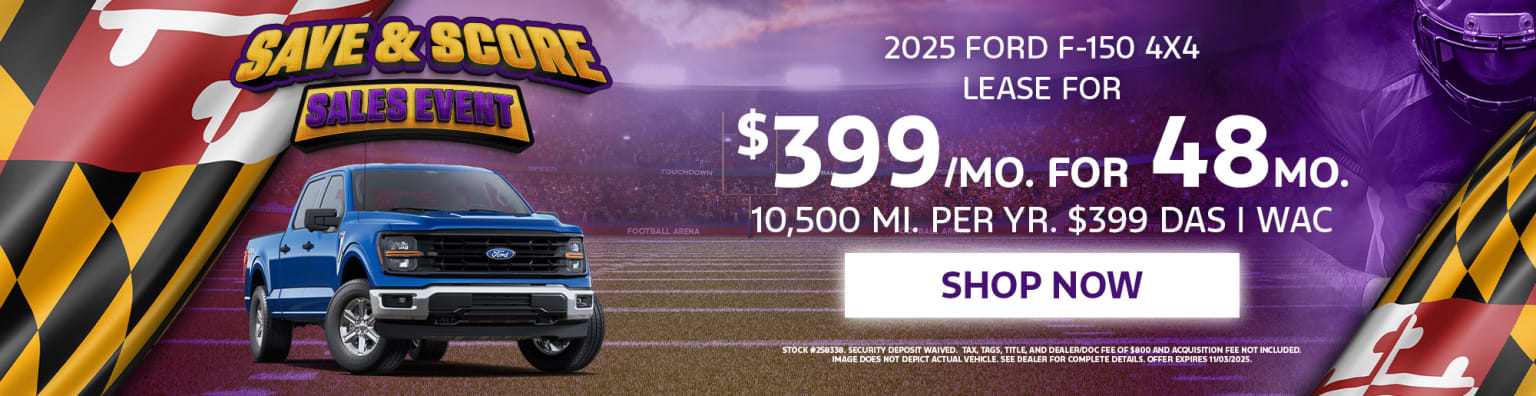 The image displays a pickup truck prominently featured in the foreground, with a promotional advertisement for a lease offer in the background.