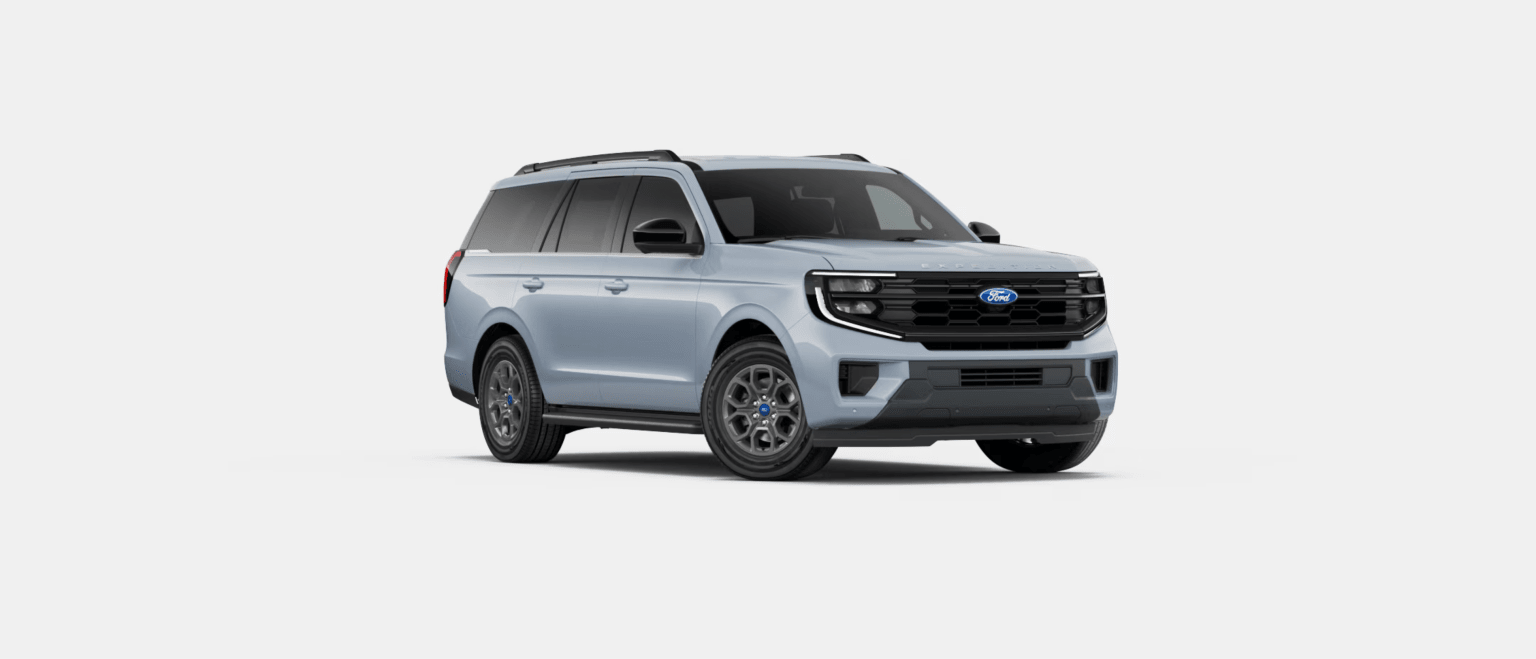 A light blue SUV is angled towards the viewer against a plain white background.