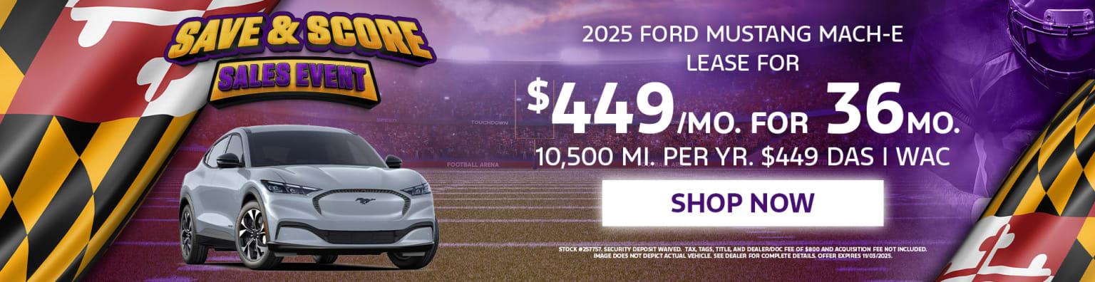The image displays a vehicle prominently featured in the foreground, with a promotional advertisement for a lease offer for 10,500 miles per year displayed in the background.