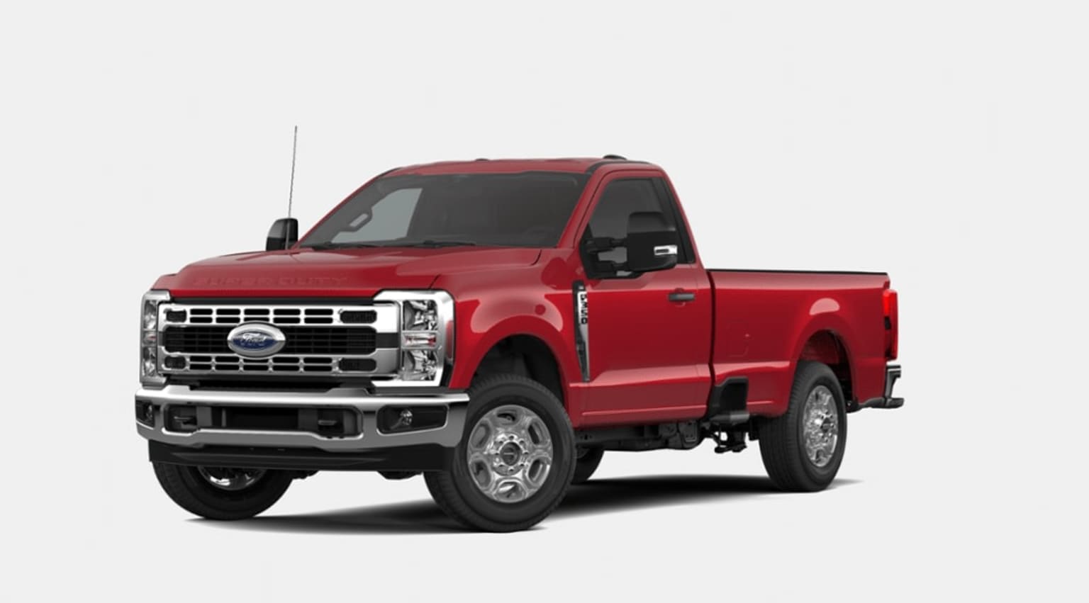 A bright red pickup truck with a rugged, off-road appearance stands prominently in the foreground against a plain white background.