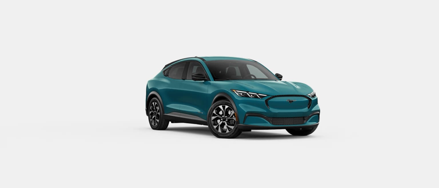 Electric vehicle in teal color with modern design on white background.