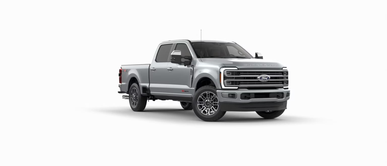 Silver pickup truck with a plain white background.