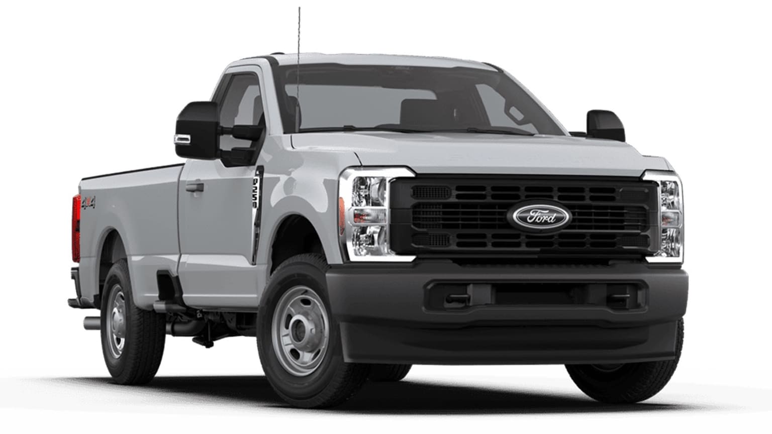 A large, gray pickup truck with a prominent front grille and headlights, set against a plain white background.