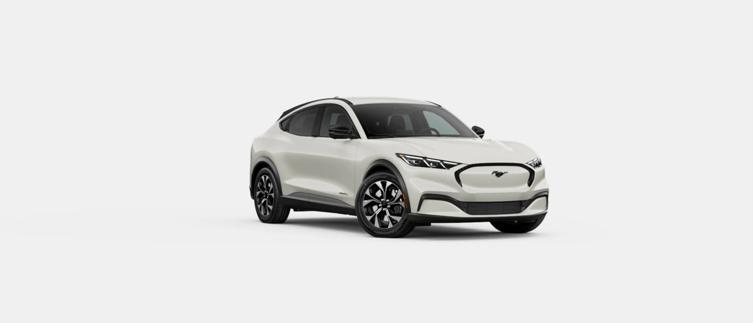 A sleek, white electric SUV with a modern, angular design stands against a plain white background.