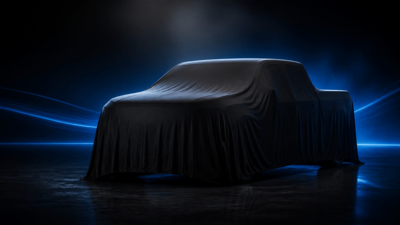 A dark pickup truck covered by a draped cloth in the foreground, with a dark blue glowing background.