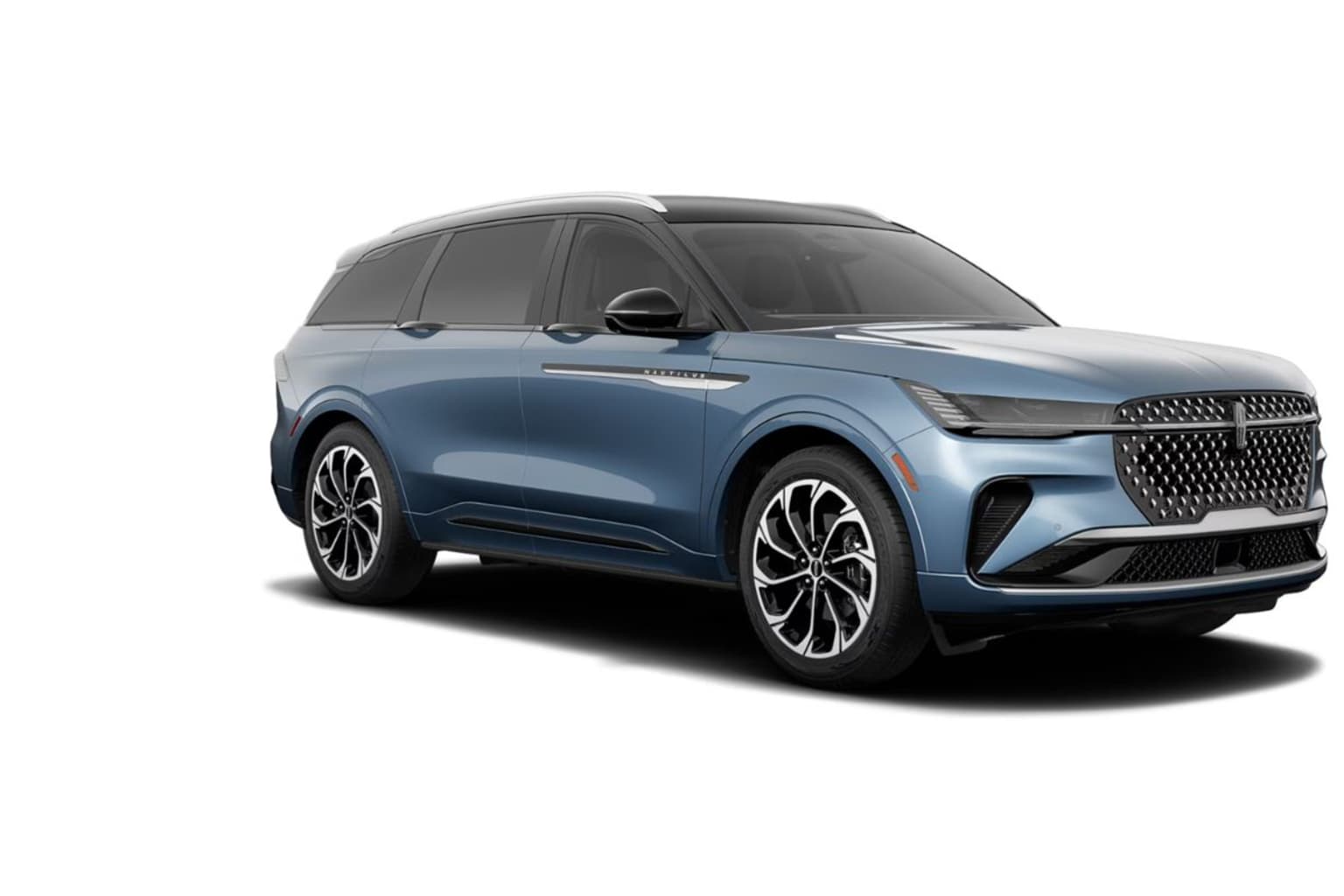 A large, sleek and modern-looking SUV with a distinctive grille design and bold, angular styling stands prominently in the frame, set against a plain white background.