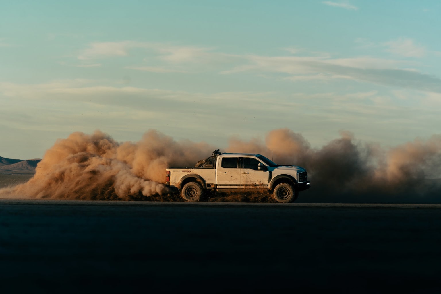 Shelby F-250 Super Baja sliding through the sand