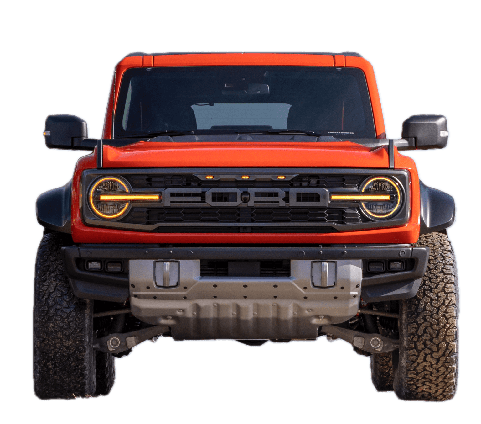 An off-road vehicle with an eye-catching orange color, rugged design, and large tires is prominently displayed in the frame.