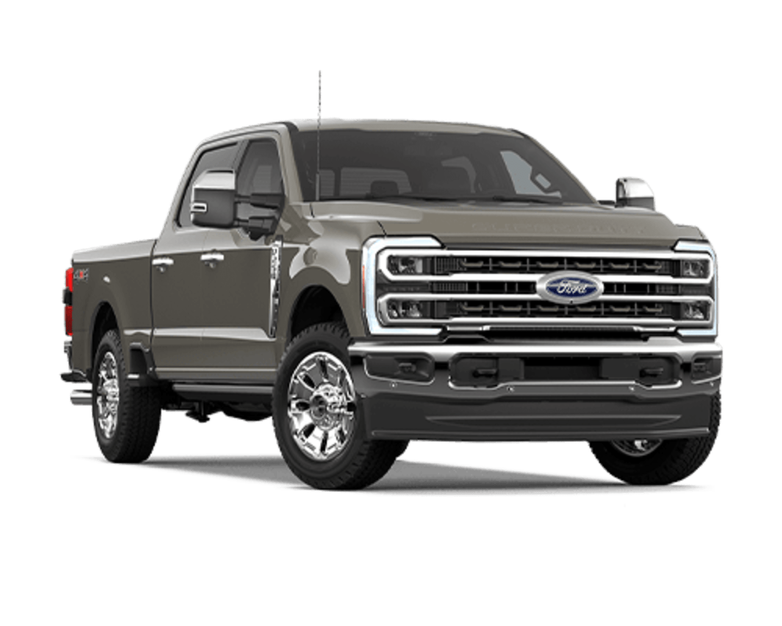 A large, silver pickup truck with a prominent grille and chrome accents, set against a plain white background.