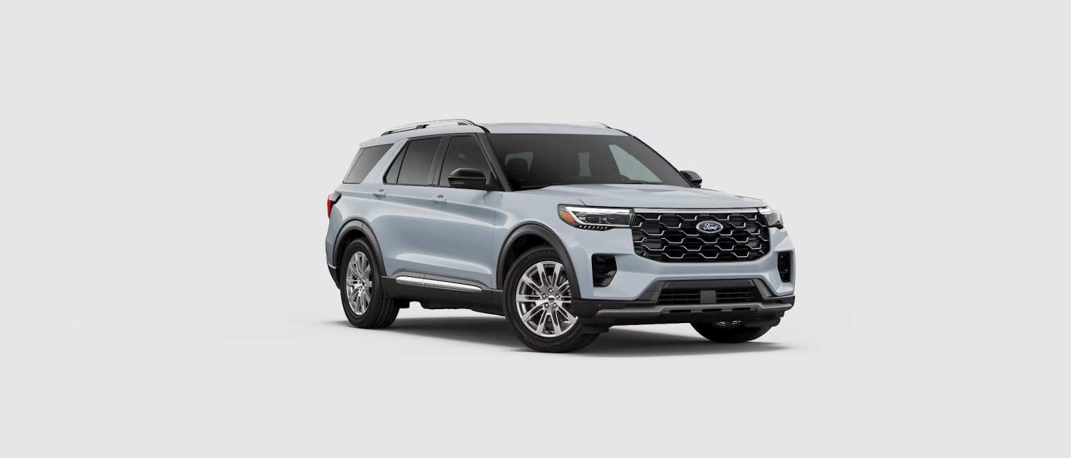 Silver-colored SUV with a distinctive grille design and rugged exterior features, set against a plain white background.