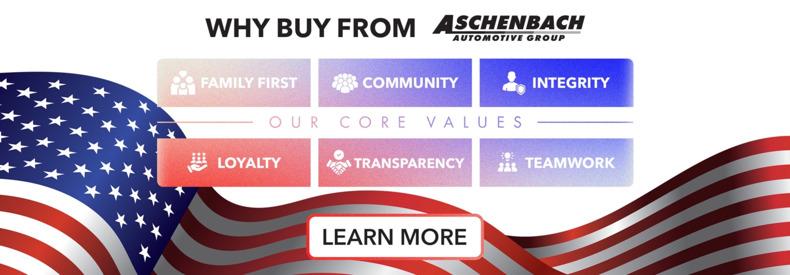 The foreground features a "Learn More" button and the American flag, while the background displays the dealership logo and their core values.