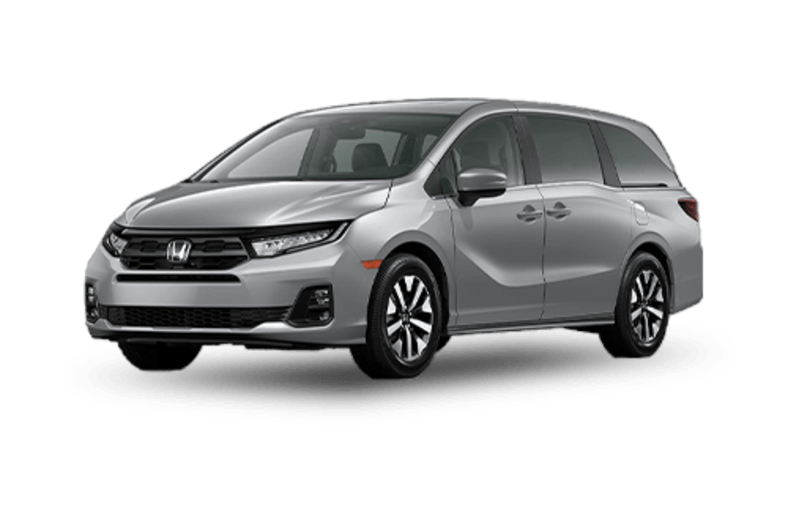Silver minivan parked on a white background.