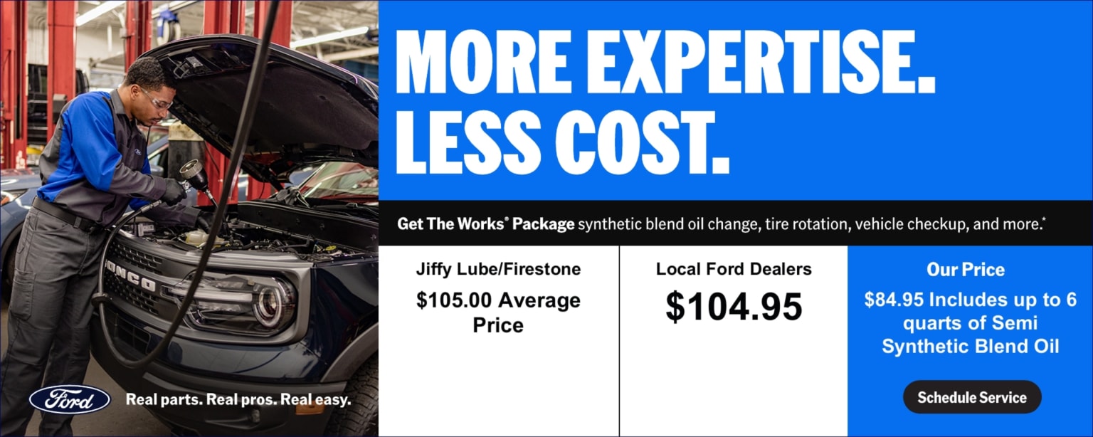 A mechanic working on a car in a garage with a blue banner overhead advertising "More Expertise. Less Cost." and a price comparison for car service.