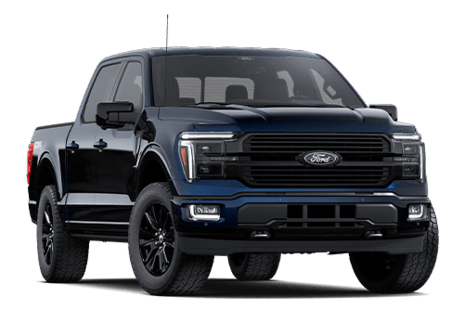 A dark blue pickup truck with large off-road tires and a rugged, aggressive appearance stands prominently in the frame against a plain white background.